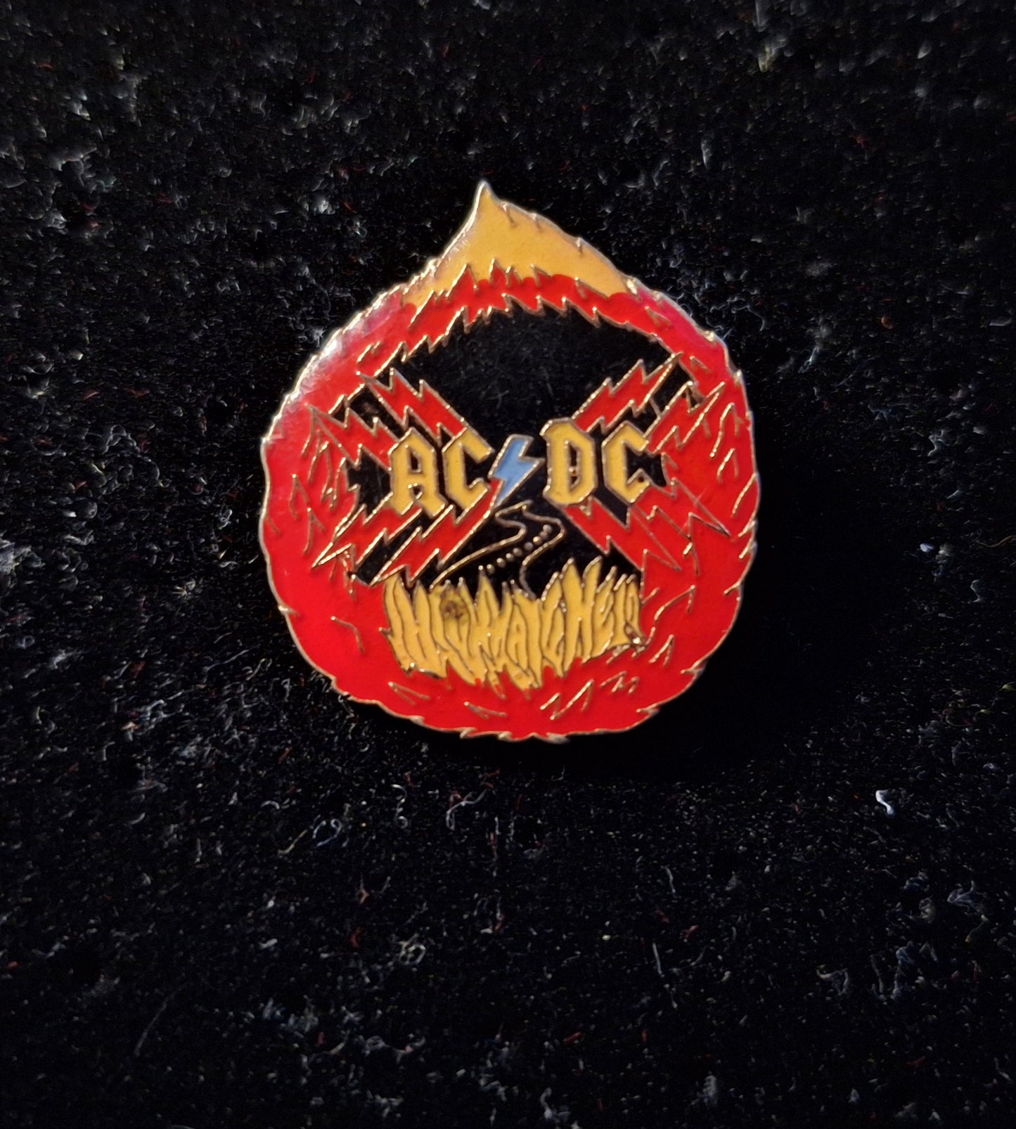 Acdc badge