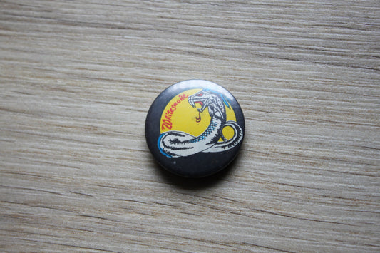 Whitesnake button
